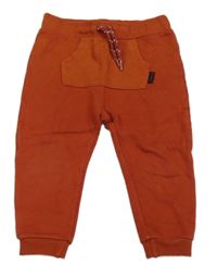 Rezavé tepláky s kapsou C&A