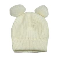 Smotanová pletená čapica s bambulemi