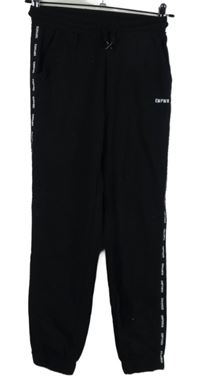 Dámské černé tepláky s nápisy Kiabi vel. 32