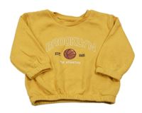 Okrová mikina s basketbalovým loptou a nápisom Primark