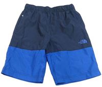 Tmavomodro-safírové šusťákové funkční sportovní kraťasy The North Face