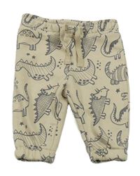 Béžové tepláky s dinosaurem Primark