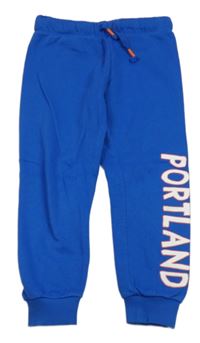 Modré tepláky s nápisom H&M