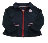 Tmavomodrá fleecová propínací mikina s nášivkou a šusťákovým prvkem 