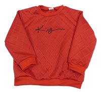 Červená vzorovaná mikina s nápisom