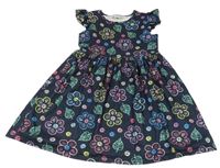 Tmavomodro-farebně bodkovaná é šaty s kvetmi a lístečky a volánikmi