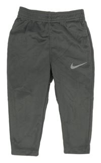 Tmavosivé športové tepláky s logom zn. Nike