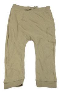 Svetlobéžové tepláky s vreckom zn. Tu