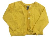 Horčicový prepínaci sveter s perforvanými srdiečkami Primark