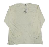 Nové - Krémové triko s kapsou Zara