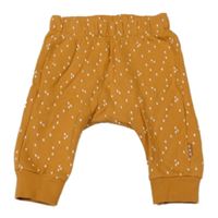 Horčicové vzorované baggy tepláky Hema