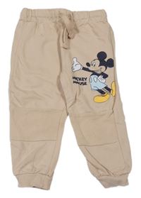 Béžové tepláky s Mickeym Disney