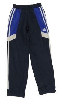 Tmavomodro-modré tepláky s logom Adidas