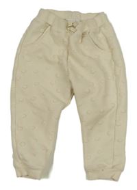 Smetanové puntíkaté turecké tepláky s mašličkou