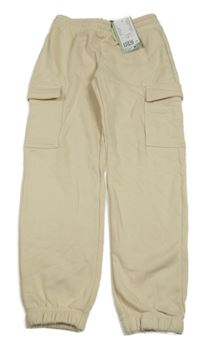 Nové - světlebéžové cargo tepláky H&M
