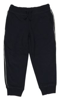 Tmavomodré tepláky s pruhom Topolino