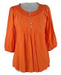 Dámska korálová blúzka s plisováním