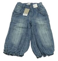 Nové - modré capri rifle s volánikmi Next