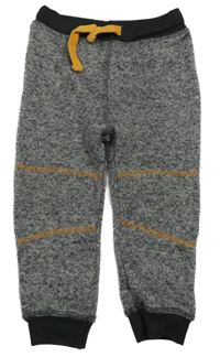 ŠEdé melírované pletené tepláky Topomini