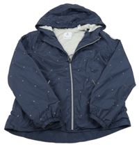 Tmavomodrá bodkovaná á šušťáková jarná bunda s kapucňou Okaidi