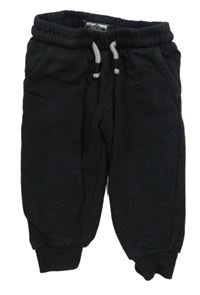 Černé tepláky Next