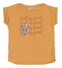 Oranžové tričko s kytičkami a nápisem S. Oliver