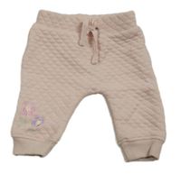 Pudrové prošívané vyteplené turecké tepláky s kytičkami dopodopo