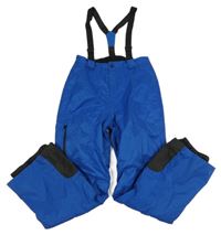 Cobaltově modro-černé šusťákové funkční zimní oteplovačky s odepínacími kšandami crivit