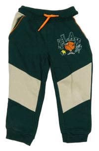 Zeleno-béžové tepláky s potiskem kids