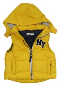Žlutá šusťáková zateplená vesta s písmeny a kapucí H&M
