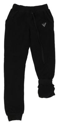 Čierne tepláky s kamienkami